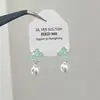 Pendientes de botón de cristal verde menta, grava, perla y estrella de mar 2026 Verano Frescos Dulces Pendientes Diseño Nicho Joyería para Orejas