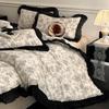 Juego de cama de algodón de estilo Hepburn francés vintage de cuatro piezas Algodón 2025 Nuevo estilo Encaje Funda de edredón Sábana Bajera Colchón