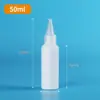 Al por mayor en stock 50ml 100ml HDPE botella blanca de apretar con boquilla puntiaguda botellas de plástico botellas dispensadoras botellas de plástico vacías