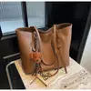 Sacola transfronteiriça feminina de grande capacidade 2024 Novo estilo Bolsa Outono High-end Bolsa de ombro Bolsa geral de estudante universitário