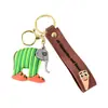 Avión, cocodrilo, montaña, mar, clásicos antiguos, tiburón, elefante, mono, plátano, figura de goma blanda, hombre palo, zapatos, bolsa, colgante, llavero