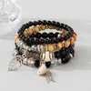 Pulseira de pingente de grão de café com folha oca estilo boêmio, pulseira de contas com cordão elástico de várias camadas, best-seller transfronteiriço