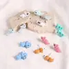 Pendientes de niña dinosaurio tiburón cachorro lindos transfronterizos pendientes de animales de dibujos animados mini joyería fresca al por mayor