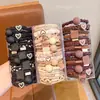 Novo Elástico de Cabelo Versátil de Alta Elasticidade para Mulheres, Corda de Cabelo de Borracha Durável, Corda Simples para Coque, Acessório de Cabeça de Alta Qualidade