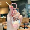 Desenho animado de areia movediça urso dos sonhos menina chaveiro cor de leite em pó boneca fofa pingente de bolsa casal presente pequeno atacado
