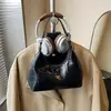 Bolso de Mano de Moda Transfronterizo de Nicho Tipo Bollo para Mujer 2026 Nueva Moda Bolso Cruzado Versátil para Salir y Trabajar Bolso de Mano Pequeño