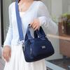 Moda transfronteiriça 2024 Nova bolsa de ombro Bolsa de pano de nylon de grande capacidade Moda Simples All-match Outgoing Crossbody Bag Trendy