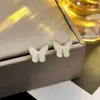 Pendientes de Perla Mariposa de Circonita de Lujo Ligero Aguja de Plata, Pendientes de Temperamento Simple Únicos, Pendientes de Diseño Nicho de Gama Alta para Mujer