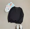 Gola redonda manga longa transparente placket cor sólida proteção solar roupa top de gaze fina verão solto feminino casual camiseta estilo coreano versátil