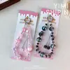 Cadena para colgar funda de teléfono de vidrio con cuentas de flor de borla, colgante de cristal exquisito, accesorio para bolso, adorno de cordón para llave de coche