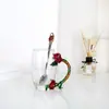 Taza de esmalte de rosa vaso doméstico resistente a altas temperaturas taza de separación de té oficina juego de té regalo para pareja fábrica de tazas