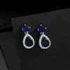Moda europeia e americana novo diamante micro-incrustado Super flash cor zircão brincos femininos transfronteiriços venda quente luz brincos de luxo moda