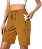 Pantalones cortos deportivos ligeros de secado rápido para mujer, transfronterizos europeos y americanos, para camping, viajes, golf, con bolsillos con cremallera y diseño casual impermeable