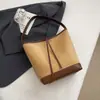 Nuevo bolso tipo cubo de Shuai Mi estilo coreano, bolsa de compras de gran capacidad, bolso de hombro casual y relajado estilo japonés