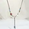 Nueva Cadena de Suéter Colorida Estilo Chino Joyería Larga para Mujer con un Accesorio de Collar de Cerámica Versátil Artístico de Gama Alta Fuente en Vivo