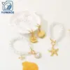 Estilo Playa Verano Corazón Diseño Retro Francés Perla Chapado en Oro Hebilla OT Acero Inoxidable Concha Estrella de Mar Colgante Pulsera