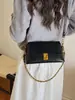 Bolso de hombro de nicho retro transfronterizo nuevo para mujer, bolso de mano versátil de alta gama, bolso elegante para el antebrazo para ir al trabajo