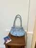 Bolso cruzado con lazo elegante para debajo del brazo para mujer, nueva versión coreana, bolso de mano de moda para el día a día, bolso de hombro de alto valor, moderno