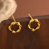 Pendientes Mobius de plata pura s999 para mujer, lujo ligero, gama alta, sencillos, 18K, nicho, versátiles, joyería de verano respetuosa con los oídos