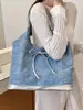 Bolsa jeans feminina 2026 nova tendência moda bolsa de ombro única bolsa tote de grande capacidade para escola e trabalho