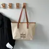 2025 Nuevo Bolso de Mano Tejido de Lujo Elegante Bolso Cubo Moda Versátil Moderno Bolso de Hombro para Mujer