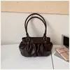 Bolso de Cubo Plegado Estilo Coreano 2026 Nuevo de un Solo Hombro de Moda Versátil Dulce Bolso de Mano de Nicho de Gama Alta