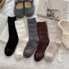 Meias grossas de lã quentes estilo japonês Youjiaxiu para mulheres no outono e inverno, até o meio da panturrilha, com padrão de losangos, emagrecedoras, de tricô grosso e com babados.