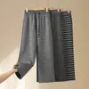 Jeans Mom Rectos con Caída Pantalones Anchos Rayados Mujer Otoño/Invierno 2026 Nuevos Pantalones de Gama Alta para Mujeres de Mediana Edad Lucir Más Joven Pantalones Largos