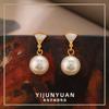 Pendientes de concha de perla de imitación Shijia de moda de lujo accesibles de Europa y América, pendientes de nicho elegantes, retro, sencillos y exquisitos de alta gama.