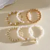 Juego de seis piezas de pulseras de perlas acrílicas vintage europeas y americanas, pulseras de nicho transfronterizas de alta gama, accesorios de mano personalizados estilo Ins