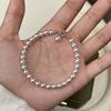 Pulseira de pérolas Shijia Manta Rose empilhada para usar pulseira de luxo leve e elegante pulseira de celebridade da Internet com luz redonda e forte