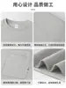 Camiseta de manga corta para hombre de algodón modal seda de hielo, moderna con costuras decorativas, bolsillo falso, versátil, silueta A simple, camiseta bordada de cuello redondo para hombre