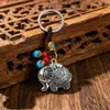 Estilo étnico chino joyería de aleación elefante auspicioso colgante de llavero para hombres y mujeres pequeño accesorio decoración venta al por mayor