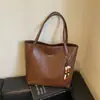 Bolsa Transfronteiriça de Alta Qualidade Grande Capacidade Feminina 2026 Nova Outono/Inverno Bolsa de Ombro Único Design de Nicho Bolsa Tote para o Dia a Dia