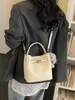 Bolso Cubo de Alta Gama de Moda para Mujer 2026 Nuevo Primavera Vintage Versátil Bolso de Mano Simple Bolso de Hombro Cruzado Moda