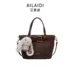 Bolso tipo cubo tote retro casual versátil para mujer, nuevo estilo 2026, de alta calidad, elegante bolso de hombro, bolso cruzado de moda