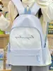 Mochila versátil de moda de verano 2026 transfronteriza, mochila estilo japonés para estudiantes de secundaria y preparatoria, ligera y de gran capacidad