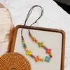 Accesorio de collar de cerámica estilo étnico vintage para mujer, diseño de corazón y estrella de alta gama, cadena larga para suéter, simple y versátil