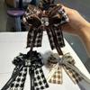 Tela de franela de otoño e invierno a cuadros grandes, scrunchie grande, diadema de cinta larga con lazo de diamantes, cuerda para coleta alta enérgica