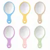 Espejos con mango de arco personalizados con patrones, logotipos y combinaciones de colores personalizados; espejos de mano portátiles y espejos de maquillaje compactos disponibles para venta al por mayor