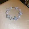 Pulsera de Zirconia con Flor de Cuatro Pétalos Transfronteriza Europea y Americana Pulsera de Lujo Ligero de Alta Gama Joyería de Mano Versátil de Moda para el Trabajo al Por Mayor para Mujeres