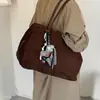 Nova Bolsa Feminina para o Dia a Dia 2026 Camurça Retrô Exquisite Bolsa de Mão Grande Capacidade Outono Ombro Único Moda Tote Veludo