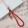 Cadena para Teléfono Móvil con Múltiples Gemas y Semillas de Bodhi Estilo Xiaohongshu para Mujer, Llavero DIY de Loto de Madera, Colgante para Bolsa de Memoria USB, Nuevo Modelo 2026