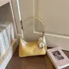 Bolso de mano para mujer Shuai Mi Jia 2026 nuevo de principios de otoño, bolso vintage para hombro o axila, bolso cruzado de alto valor para el día a día