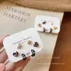 Pendientes de cachorro lindos amor pendientes mujer otoño e invierno nuevos pendientes de traje de dibujos animados pendientes de diseño pequeño exquisito
