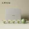 En las montañas, volviendo a los pinos, los campos verdes, lirio del valle pintado a mano, un juego de té kung fu de cuatro tazas, un regalo de negocios para personas mayores