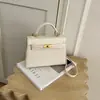 Bolso Kelly Vintage para Mujer 2024 Nuevo Modelo Bolso de Hombro Simple de Moda Bolso de Mano con Textura Única Bolso Cruzado