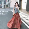 Conjunto de duas peças de moda casual de verão 2026, com bordado estilo étnico, colete jeans e saia, que reduz a idade e emagrece