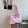 Bolso de hombro retro transfronterizo para mujer, nuevo bolso de hombro versátil coreano de verano 2026, bolso cubo informal de nicho para el día a día