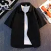 2026 Verano Nuevo Estilo Estilo Japonés Seersucker Color Sólido Manga Corta Camisa Talla Grande Holgada Camisa de Manga Corta para Hombre Verano